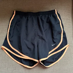 Nike running shorts black and orange thumbnail 1