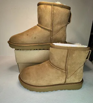 UGG Classic Mini II Genuine Shearling Lined Boot casual comfy style winter cozy thumbnail 1
