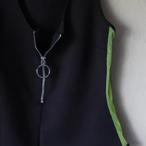 Forever 21 Black zip-up bodysuit with mesh neon green on the sides. thumbnail 2