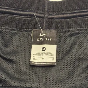 Nike Running Shorts Womens Size Medium Black Dri-FIT Chevron Texture Athletic thumbnail 4