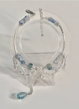 Handmade Hand Crafted Silver Bracelet with Blue and White Beads and Mermaid Tail Charm thumbnail 1