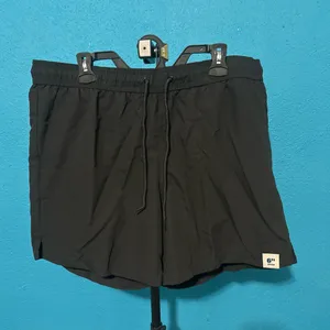 Men’s size extra large black swim shorts 6 inch in thumbnail 1