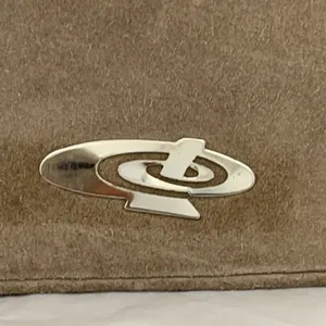 Vintage Montgomery Ward taupe suede fold over clutch. thumbnail 3