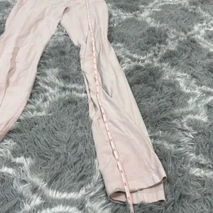 Aritzia tna baby pink flared high waisted leggings size Xs Has some staining a thumbnail 5