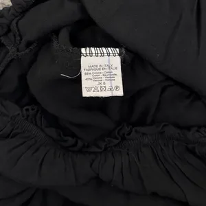 Brandy Melville Black Off The Shoulder Long Sleeve Stretch Ruffle Romper OS thumbnail 6