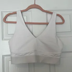 Fabletics white sports bra thumbnail 1