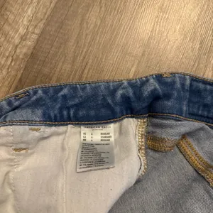 American Eagle Next Level Stretch Hi-Rise Ripped Jeggings thumbnail 7