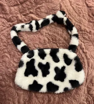 Black and White Faux Fur Cow Print Shoulder Bag thumbnail 1