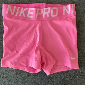 Nike Women's Bright Pink Athletic Shorts thumbnail 1