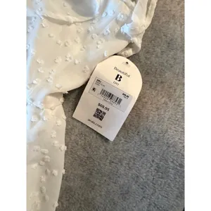 Arula White Swiss Dot Mini Dress NWT Size B 2X V-Neck Ruffle Sleeve Ivory thumbnail 2