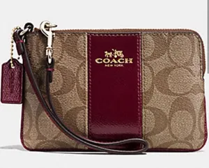 COACH Corner Zip Wristlet in Signature Khaki PVC and Sherry Leather RARE Color thumbnail 1