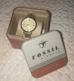 Gold Fossil watch thumbnail 1