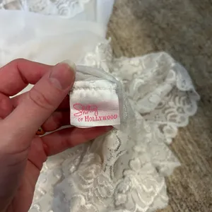 Shirley of Hollywood White lace babydoll dress with adjustable straps and lace trim thumbnail 3