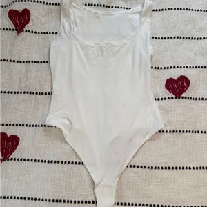 Chic White Lululemon Bodysuit size small thumbnail 2
