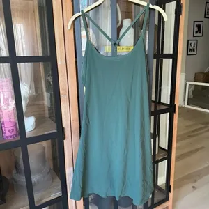 Outdoor Voices exercise dress emerald workout tennis shorts pocket adjustable thumbnail 10