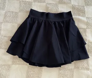 Lululemon Court Rival High Rise Skirt Black size 2 thumbnail 1