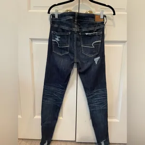 Women's American Eagle Distressed Dark Denim Skinny Jeans thumbnail 4
