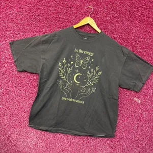 Be the energy you wish to attract T-shirt size O/S. thumbnail 3