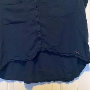 A&F navy blue short sleeve button down , hi/low hem thumbnail 2