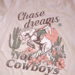 Amused by blue graphic T-shirt cotton fabric size small chase dreams not cowboys thumbnail 3