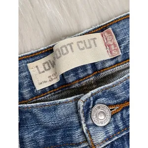 Levi’s Faded Whiskered High Rise Denim Cut Offs from Mens Jeans thumbnail 2