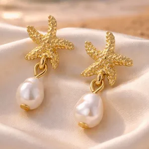 Gold Starfish Pearl Earrings thumbnail 1
