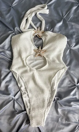 Textured White One-Piece Swimsuit with Starfish Accents thumbnail 1