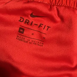 Nike Dri-Fit Women Size Medium Red/White Shorts thumbnail 5
