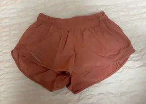 Salmon colored hotty hot lululemon shorts  thumbnail 1