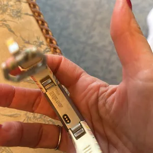 Fitbit barely used. As is. No idea what model. Cute band purchased separately thumbnail 2