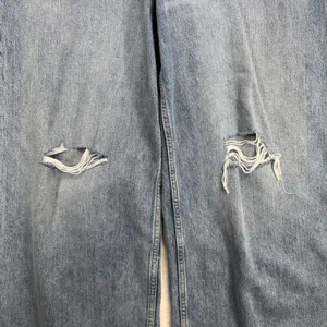 Gap 14 32 Mid Rise Destructed SuperSoft Baggy Jeans Medium Wash Denim 626631 thumbnail 4