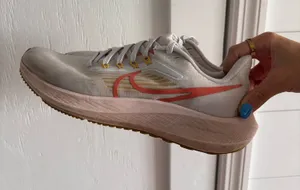Nike Women’s White Running Shoes  thumbnail 1