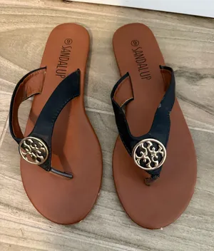 Sandalup Women's Black and Brown Thong Sandals with Gold Medallion thumbnail 1