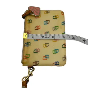 Vintage DOONEY & BOURKE Signature Multicolor Coated Canvas Wristlet thumbnail 7