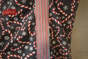 Mia and Tess candy cane and snowflake Christmas tote in black, red and white. thumbnail 6