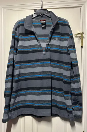 The North Face Striped Sweater is a Men’s size XL. thumbnail 1