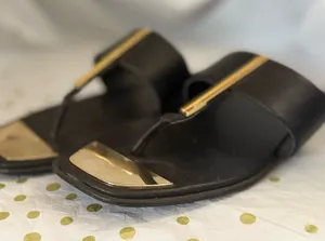 DKNY Black Leather Slide Sandals with Gold Accents thumbnail 1