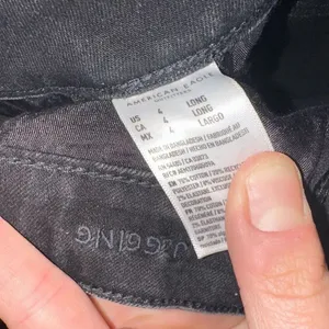 American Eagle black normcore 4 long stretchy jeggings thumbnail 2