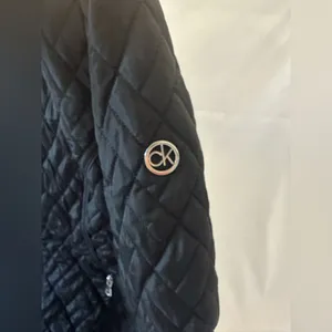 Calvin Klein women’s size large quilted black jacket thumbnail 6