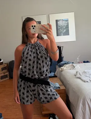 Escapada chic black & white geometric print halter romper thumbnail 1