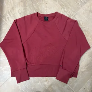 Nike Dri-FIT Embossed Logo Sweatshirt thumbnail 1