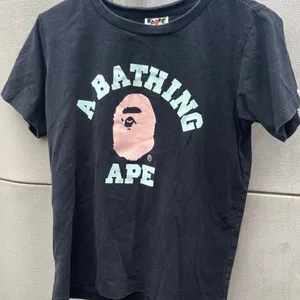 Vintage A Bathing Ape BAPE Logo Pink Green T-Shirt Women’s Size Small thumbnail 1