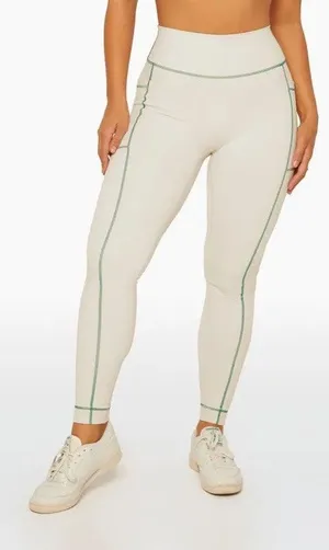SET Active Courtside Volley Leggings in a cream green stitching sz S thumbnail 1