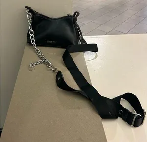 Madden NYC Elegant Black Bag with Gold Zipper-preowned thumbnail 1