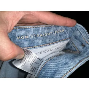 American Eagle destroyed light wash relaxed 10 mom jeans thumbnail 2