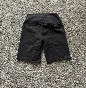 ALO Yoga Black Performance Biker Shorts with Subtle Logo thumbnail 3
