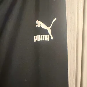 Puma Women's Black with white side stripe w/puma logo Crisscross Backless Dress thumbnail 2
