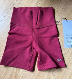 ALO Yoga Ribbed High-Waist Bike Shorts in Romance Red thumbnail 1
