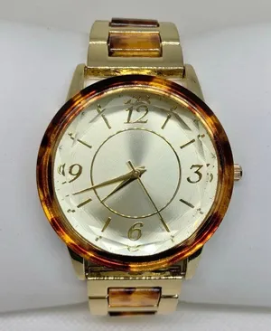 Gold tone tortoiseshell style women watch 38mm quartz analog up to 7.5” running thumbnail 1