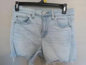 American Eagle Outfitters next level stretch hi-rise shortie jeans in light wash blue size 6. thumbnail 1